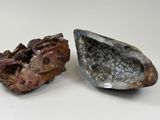 two pieces of rock on a white surface with a white background
