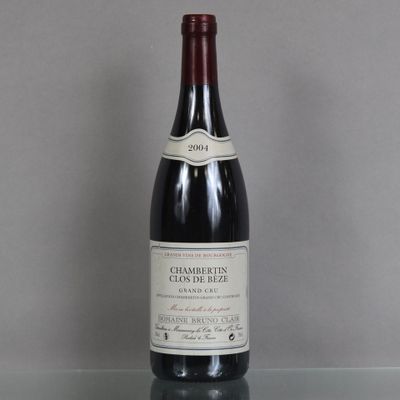 a bottle of wine that is sitting on a table