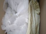 a box with a white dress inside of it