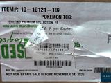 a box of pokemon tcg items on the table