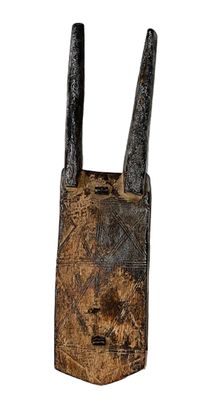 an image of an old cell phone with two horns sticking out of it ' s back