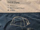 a close up of a blue and white tent with instructions on it
