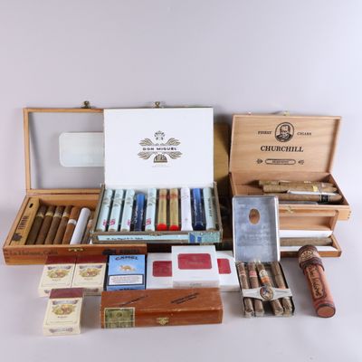 a box of cigars and a box of cigars on a table