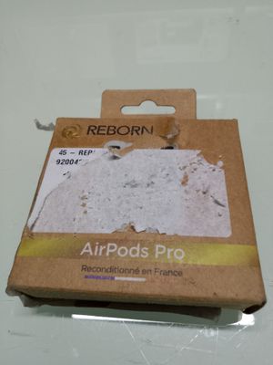a box of airpods on a table with a sticker on it