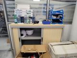 many boxes that are sitting on the floor in the room