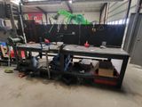 a picture of a workbench in a garage with a lot of tools