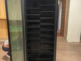 an image of a refrigerator that is in the middle of a room
