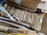 a box full of files and a pair of scissors