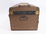 a brown suitcase with a black handle on a white background