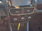 a picture of a car dashboard with a clock on it