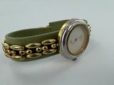 wrist watch with green leather band and gold tone chain