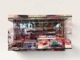a picture of a display case filled with toy cars