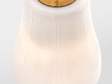 an image of a white lamp with a gold base and a white shade