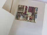 an open book with a picture of people on it