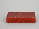 a close up of a red box on a white surface