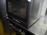 a microwave sitting on a counter in a kitchen