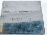 an image of a piece of metal that has a stamp on it