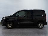 a picture of a black van parked in a room