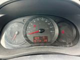 a close up of a car dashboard with a speedometer