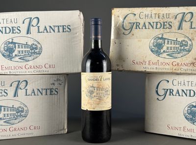 three bottles of wine sitting next to each other on top of a table