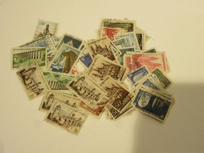a lot of stamps that are on the table