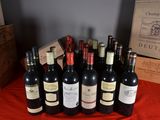 several bottles of wine are lined up on a table