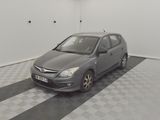 a grey car that is parked in a garage