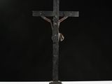 a wooden crucifix with a cross on top of it