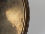 a silver tray with a mirror on top of it
