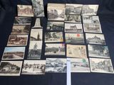 several old postcards of old buildings and buildings on a table