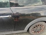 a dog that is sitting in the back seat of a car