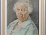 portrait of an old woman in a green shirt