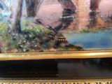 a picture of a painting on the wall of a room