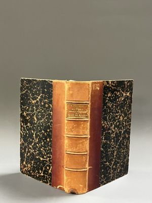 a close up of a book that is open on a table