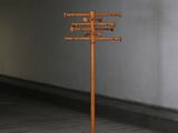 an image of a wooden pole in a parking garage