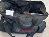 a black bag with tools in it on the floor