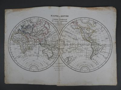 an old map of the world on a book with a black background