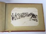 an old photo of a group of men standing in a line