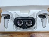 a box with a pair of glasses and a pair of headphones