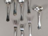 several spoons, forks, and spoon spoons are arranged in a circle