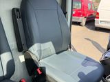 two seats in the back of a van with the driver ' s seat up