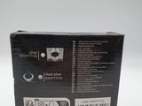 the back of a black box with a white barcode on it