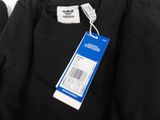 a close up of a black shirt with a price tag on it