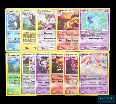 plusieurs cartes Pokémon sur fond noir, bordées de jaune