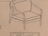cardboard box with a drawing of a wooden chair on top of it