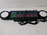 an image of a close up of a power strip on a table