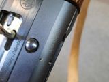 a close up of a gun that is on a table