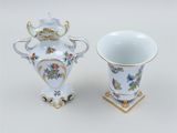 pair of porcelain vases with flowers and birds painted on them