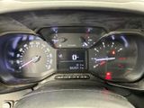 a close up of a car dashboard with a speedometer and gauges