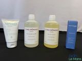 three different types of skin care products sitting on a table